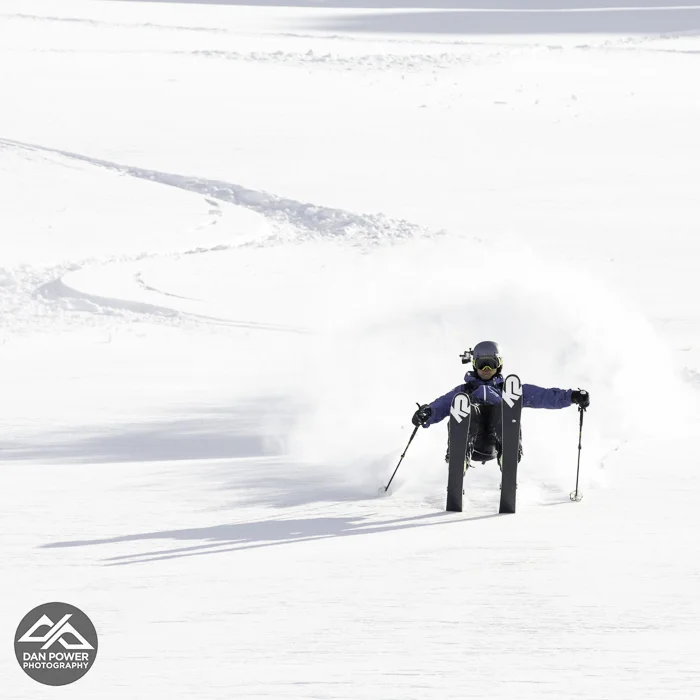 Powder wheelie celebration above the saddle basin chair. Photo: Dan Power