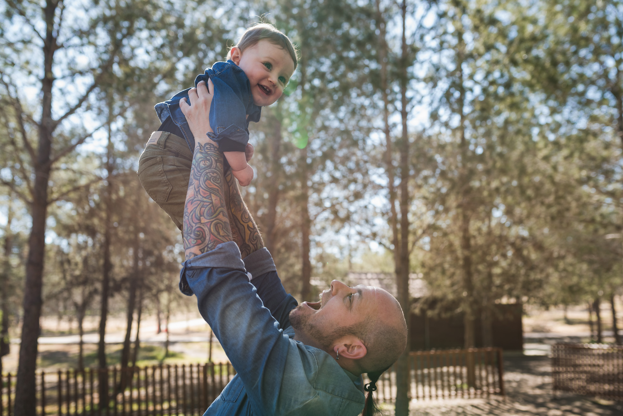 family session in the park up in the air.jpg