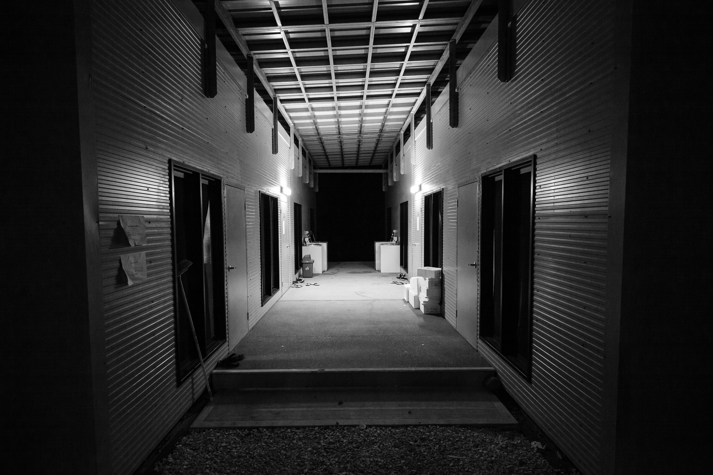 Nearby Nibok camp is home to families and, in this particular block, unaccompanied minors on Nauru. While clean and new, it is sparse, bleak housing unsuited to accommodating adolescent children on Nauru without family.