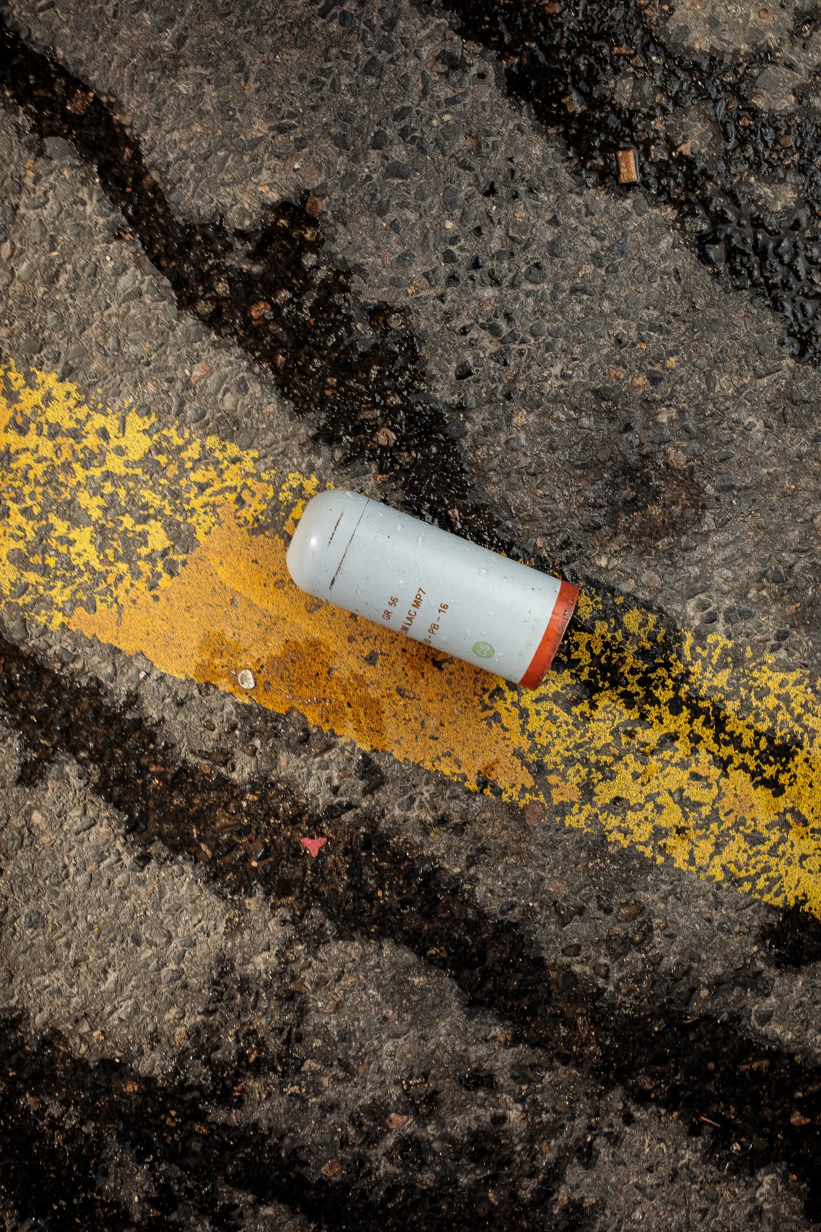 Tear gas canister and water cannon remnants, 2018