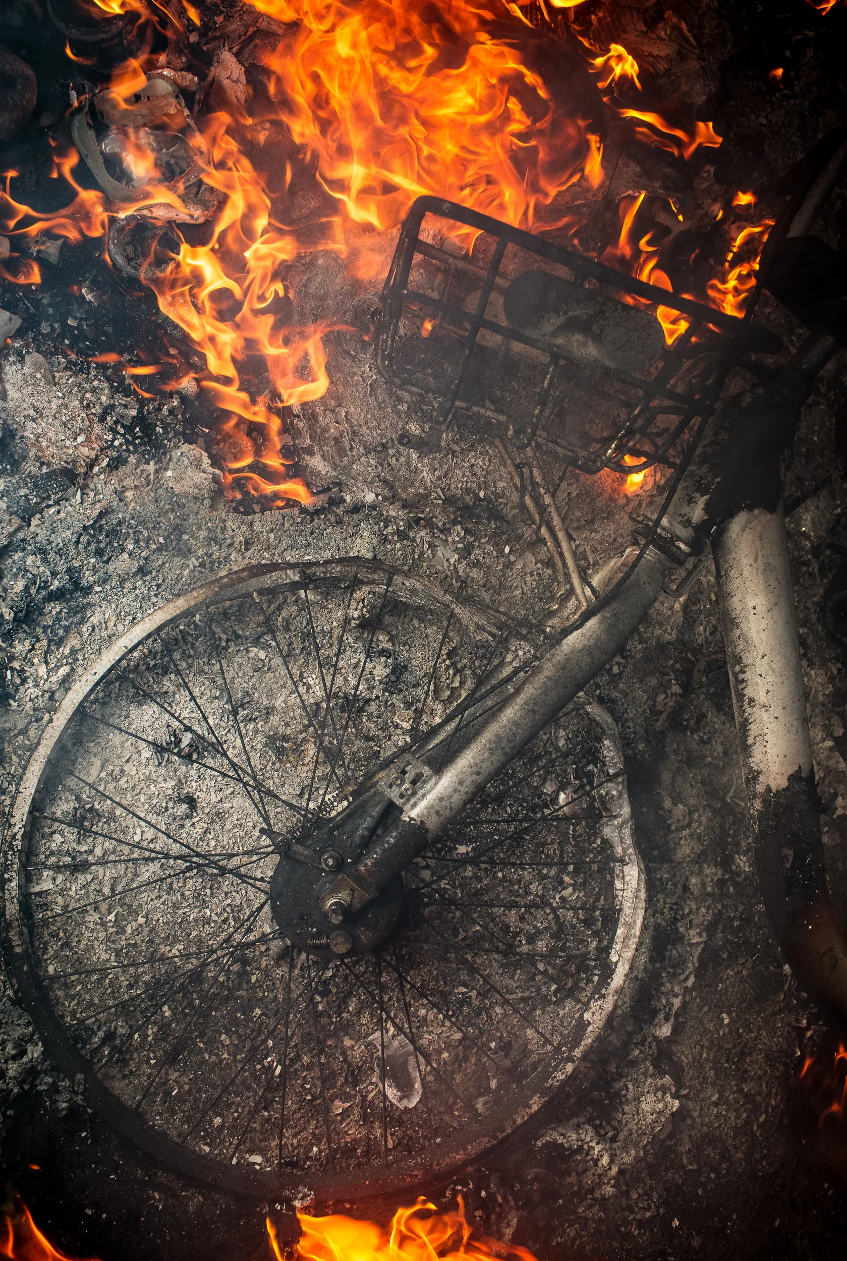 Melting share bike, ash and flames, 2018