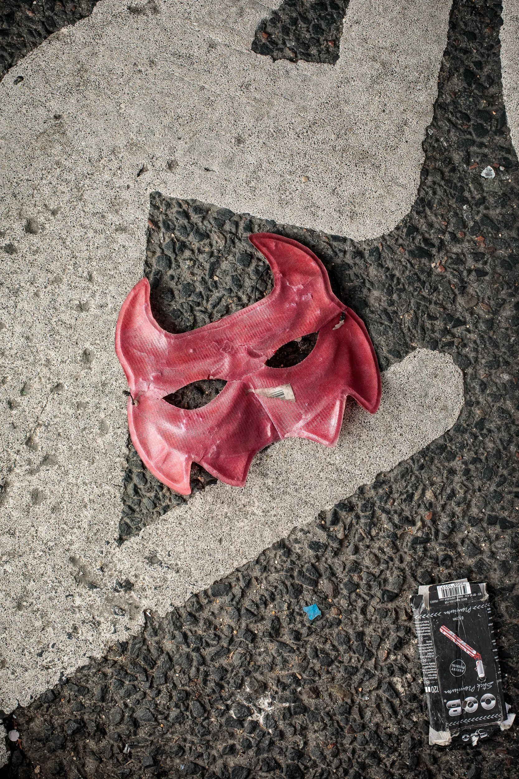 Trampled mask and cigarette filters, 2018