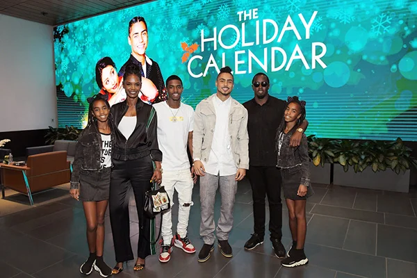 (L-R) Kim Porter, Christian Casey Combs, Quincy Brown, Sean "Diddy" Combs,.D'Lila Star Combs and Jessie James Combs attend "The Holiday Calendar" Special Screening Los Angeles at NETFLIX Icon Building on October 30, 2018 in Los Angeles, California. (Credit: Getty)