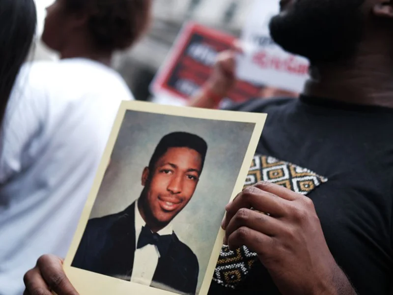 Protestors honor the memory of Eric Garner (Credit: Getty)