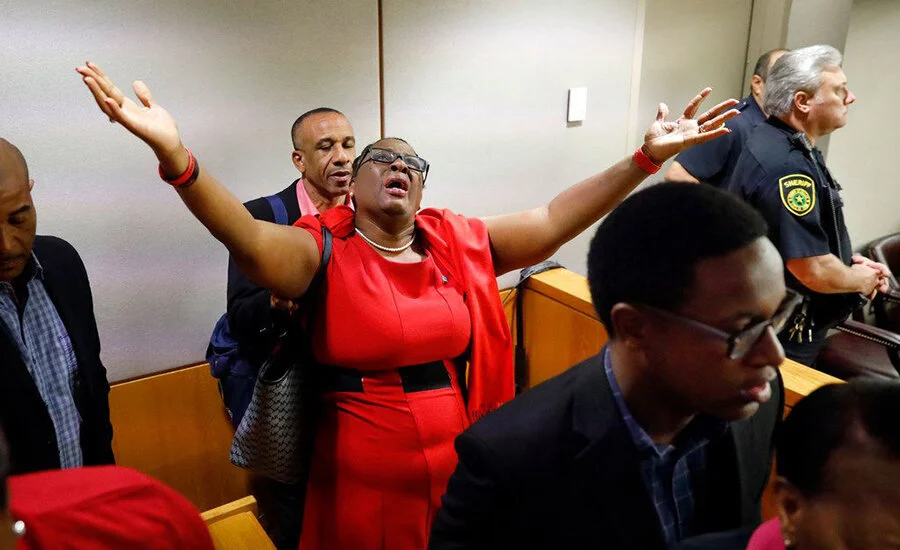 Botham Jean’s mother, Allison Jean, rejoices when Amber Guyger is found guilty of murdering her son Botham Jean (Credit: Associated Press)