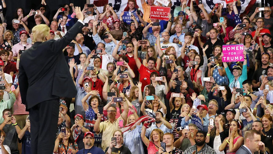 President Donald Trump waves to supporters in Minnesota (Credit: Getty)