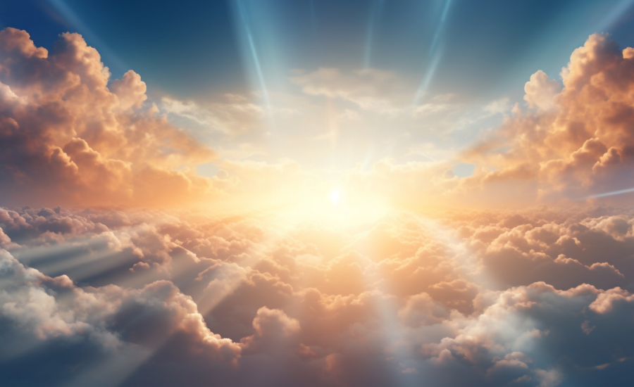 Sunbeams breaking through clouds in a bright sky, evoking the believer's hope of eternal life in Heaven