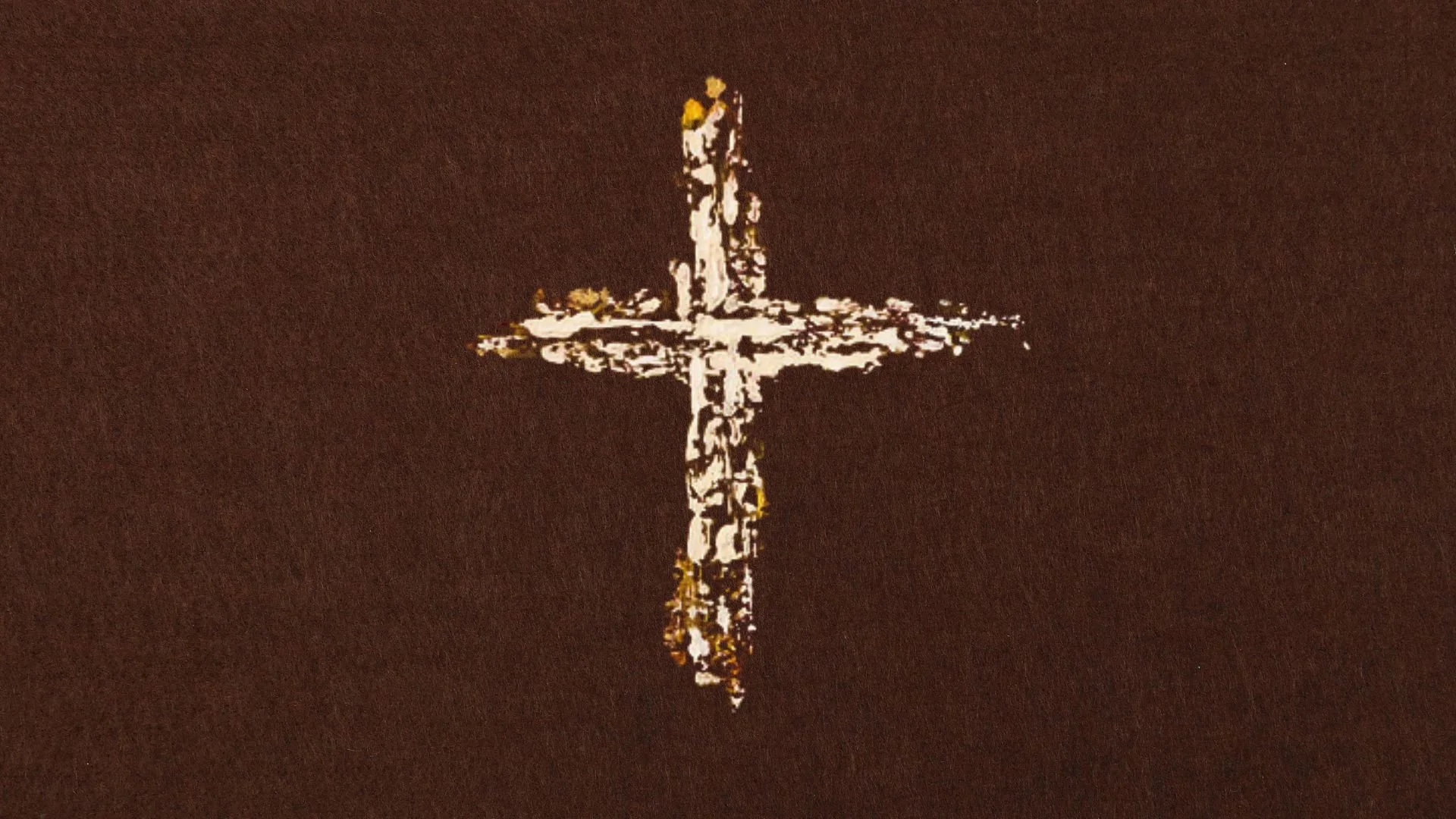 Hand-painted cream and gold cross on a dark brown textured background.