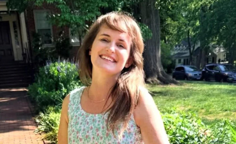 Lyndsey Fifield smiling outdoors, Instagram photo