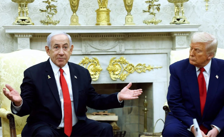 Israeli Prime Minister Benjamin Netanyahu and President Donald Trump sit in the Oval Office during a meeting, with Netanyahu gesturing as Trump looks toward him.