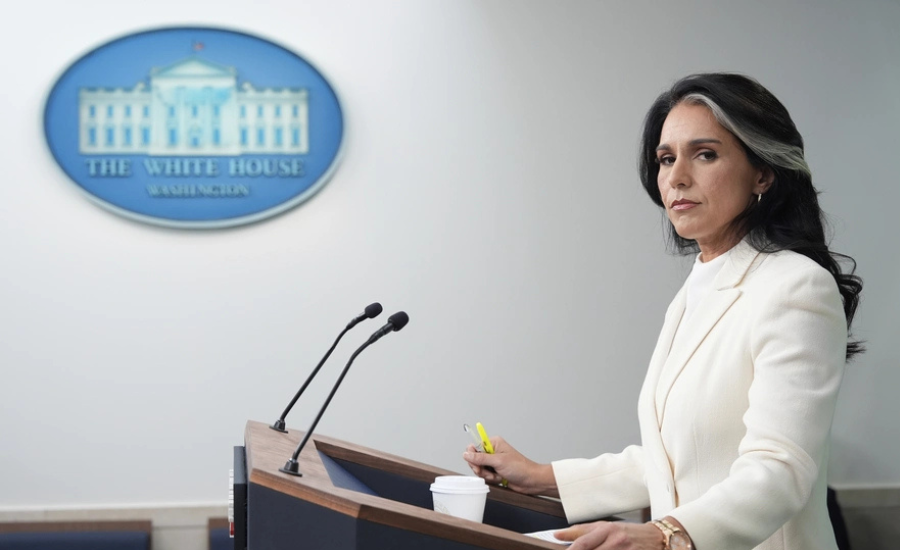 Director of National Intelligence Tulsi Gabbard stands at a podium beneath the White House seal in the press briefing room.