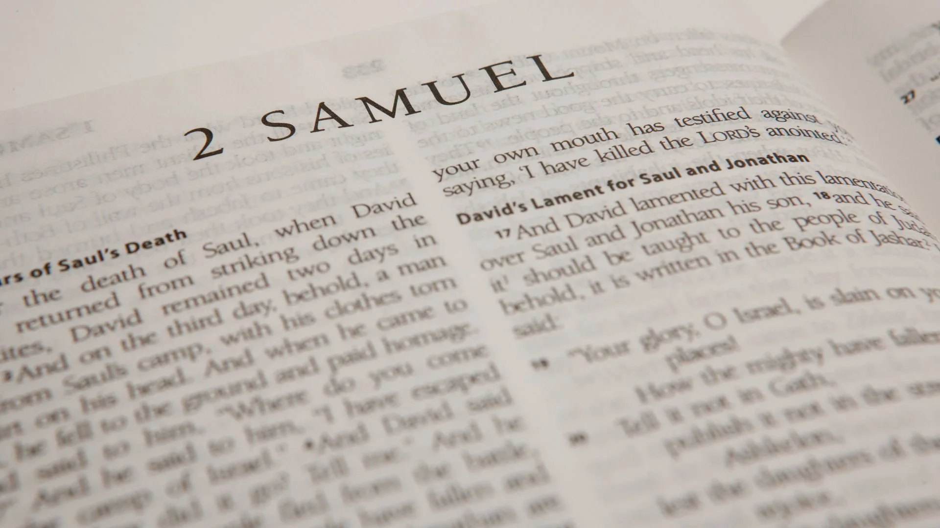 An open Bible at the beginning of 2 Samuel, with “the LORD’s anointed” visible in the text.