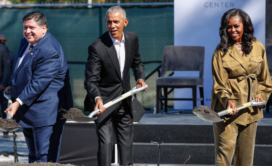 Illinois Gov. J.B. Pritzker, former President Barack Obama, and former first lady Michelle Obama hold shovels of dirt at the Obama Presidential Center groundbreaking ceremony in Chicago, September 2021