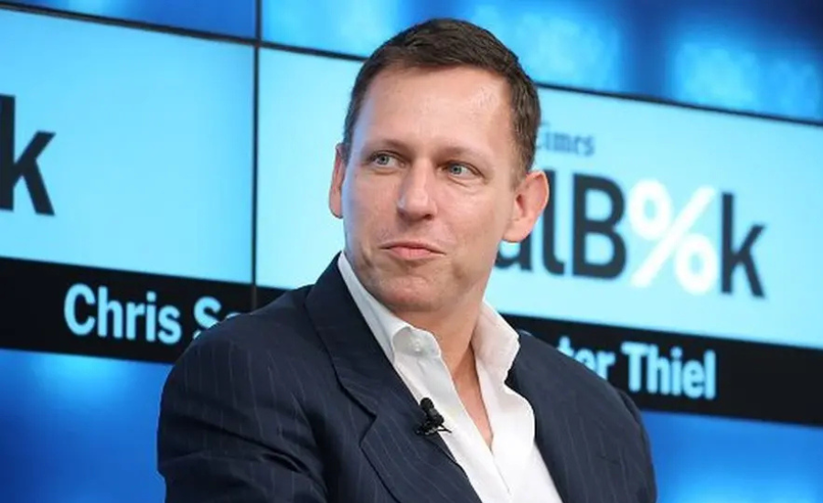 Peter Thiel at a conference panel discussion; the Silicon Valley investor whose Christian faith influenced JD Vance's religious journey