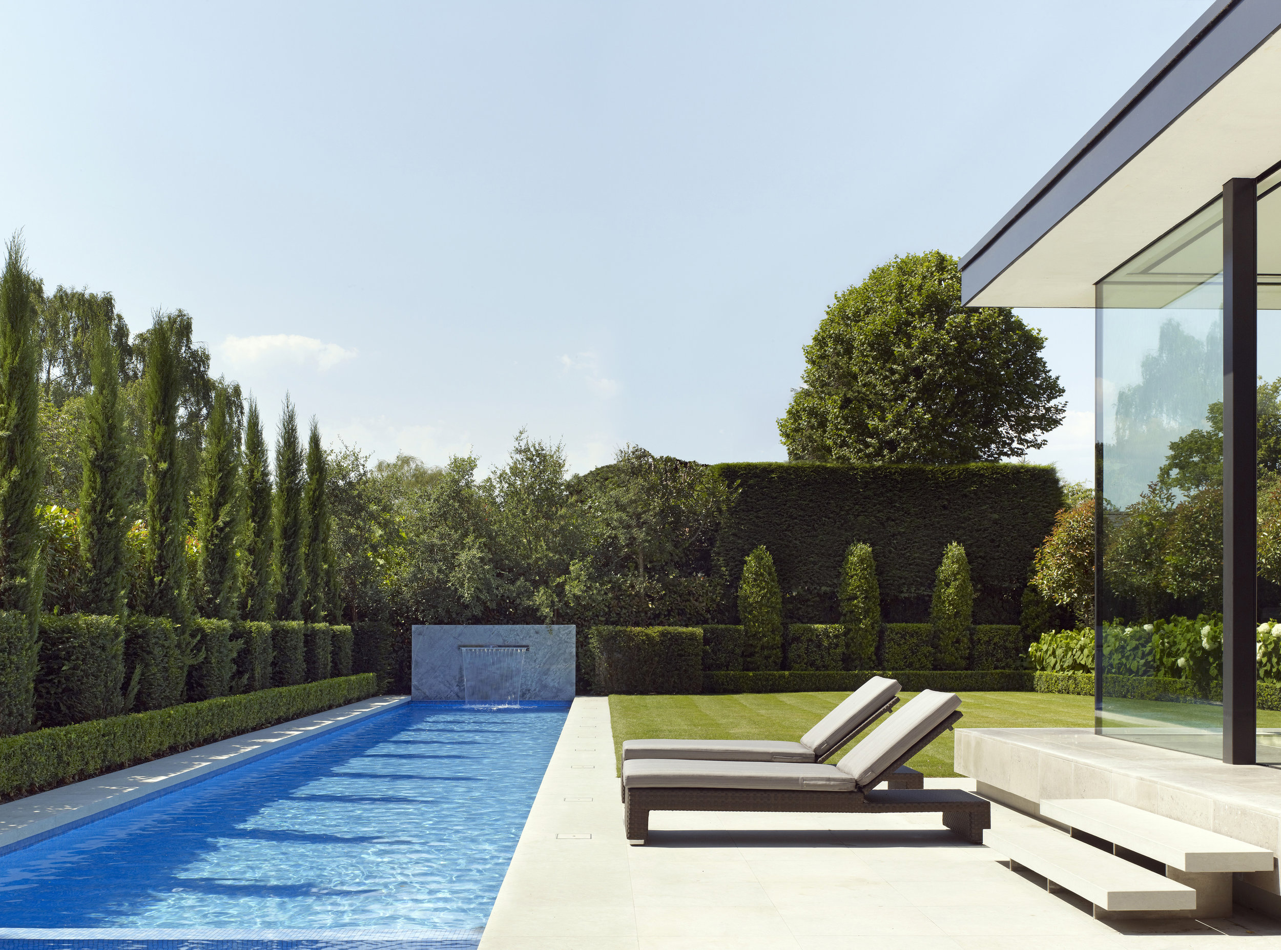 Award Winning Luxury House Renovation London, including swimming pool jacuzzi car lift and gym, by minimalist London architect practice Thompson + Baroni