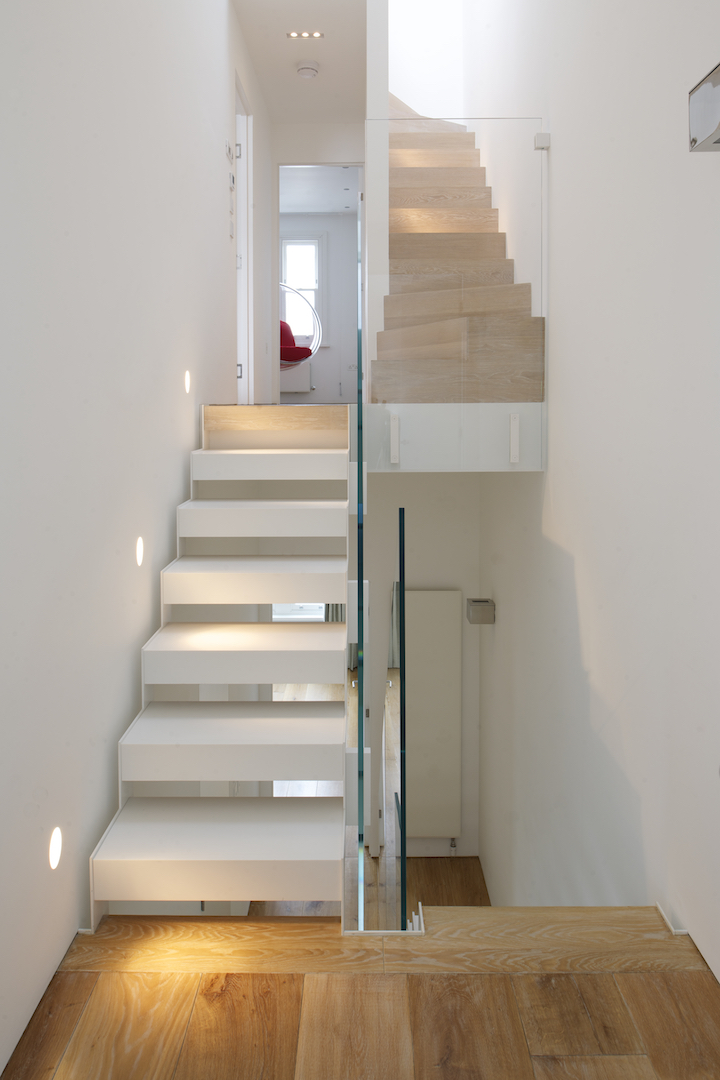 full renovation townhouse in the heart of Kensington including bespoke kitchen and stairs by minimalist London architect practice Thompson + Baroni