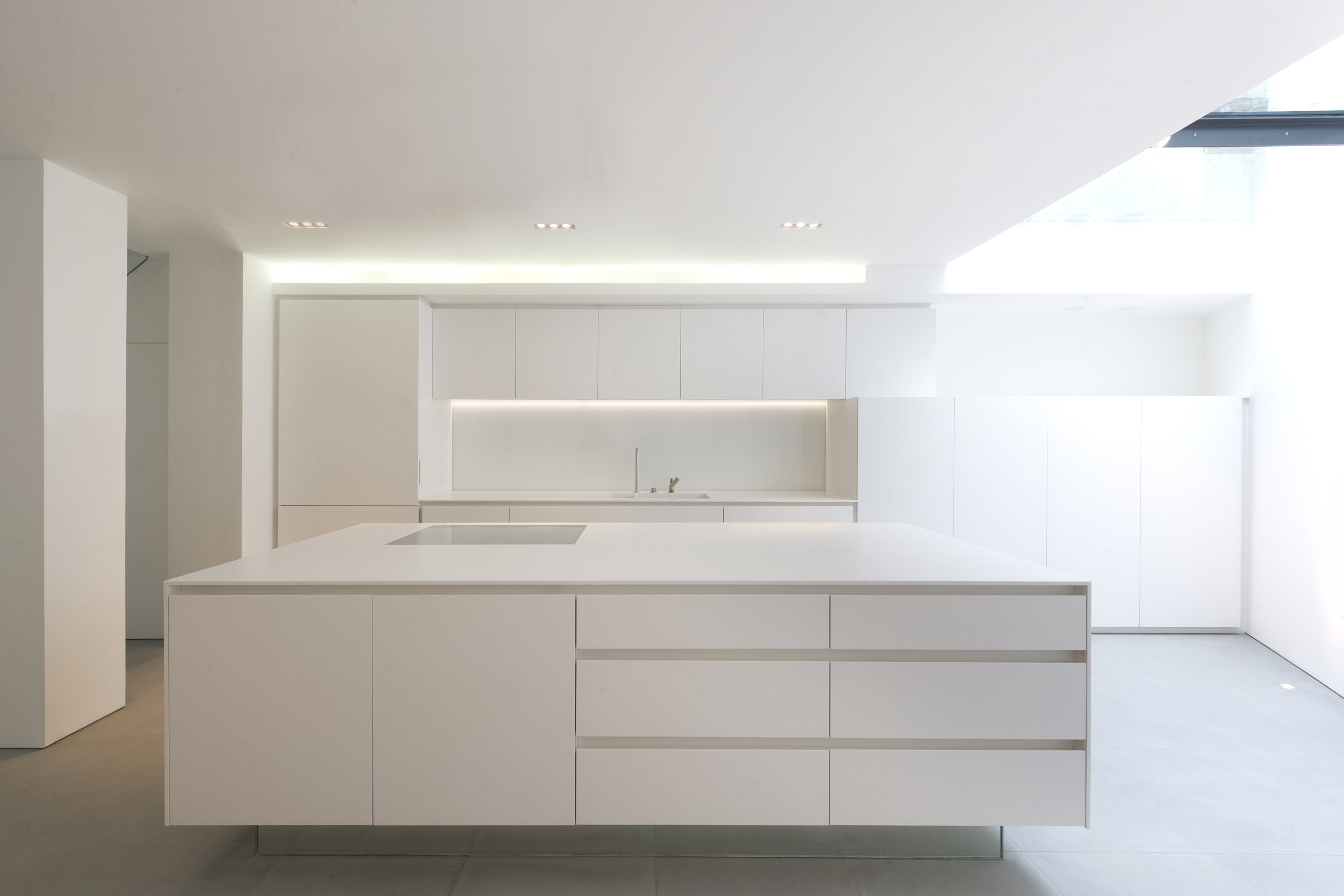 full renovation townhouse in the heart of Kensington including bespoke kitchen and stairs by minimalist London architect practice Thompson + Baroni