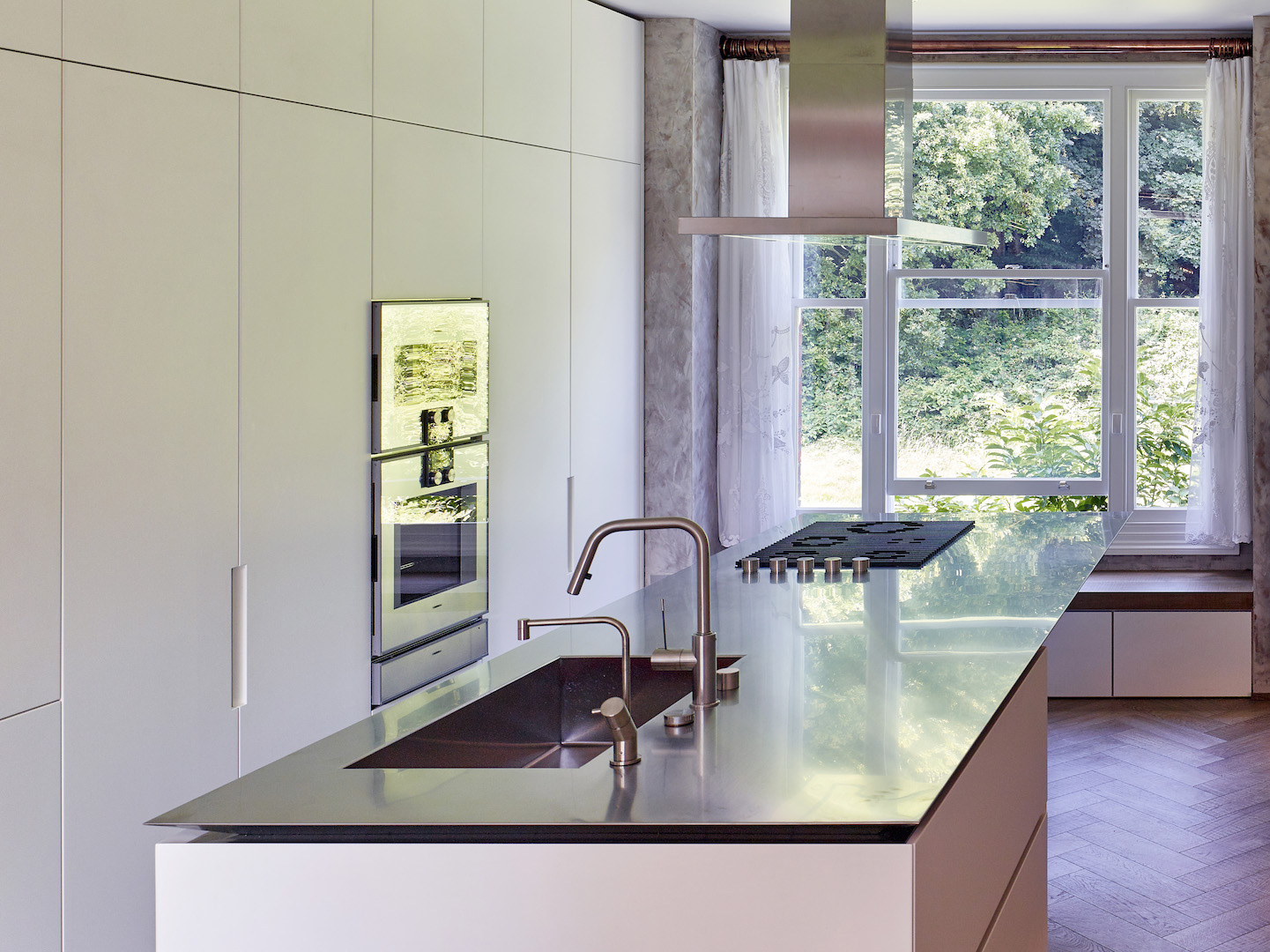 full renovation townhouse in Hampstead including Boffi kitchen and bespoke staircase by minimalist London architect practice Thompson + Baroni architects 