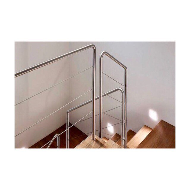 American walnut clad stairs with a lightweight stainless steel balustrade #stairs #america #walnut #staircase