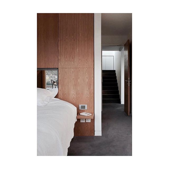 Oak clad walls make this bedroom feel warm #bedroom #oak #wood #warmth #mirror