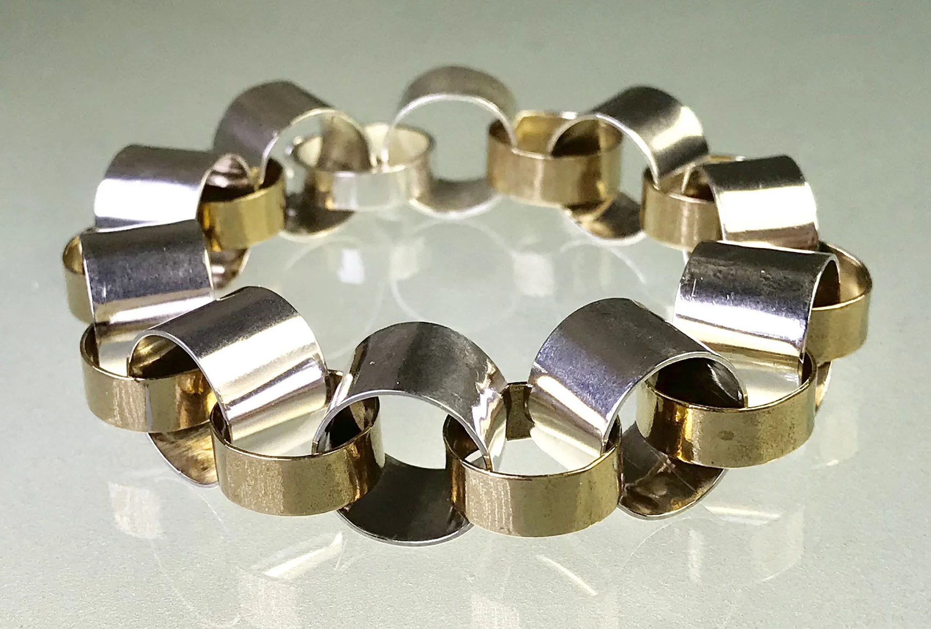   "The Project" #2   (original design Joana Goldberg).  Sterling and Brass. Currently fits 6.75" wrist. $425. 