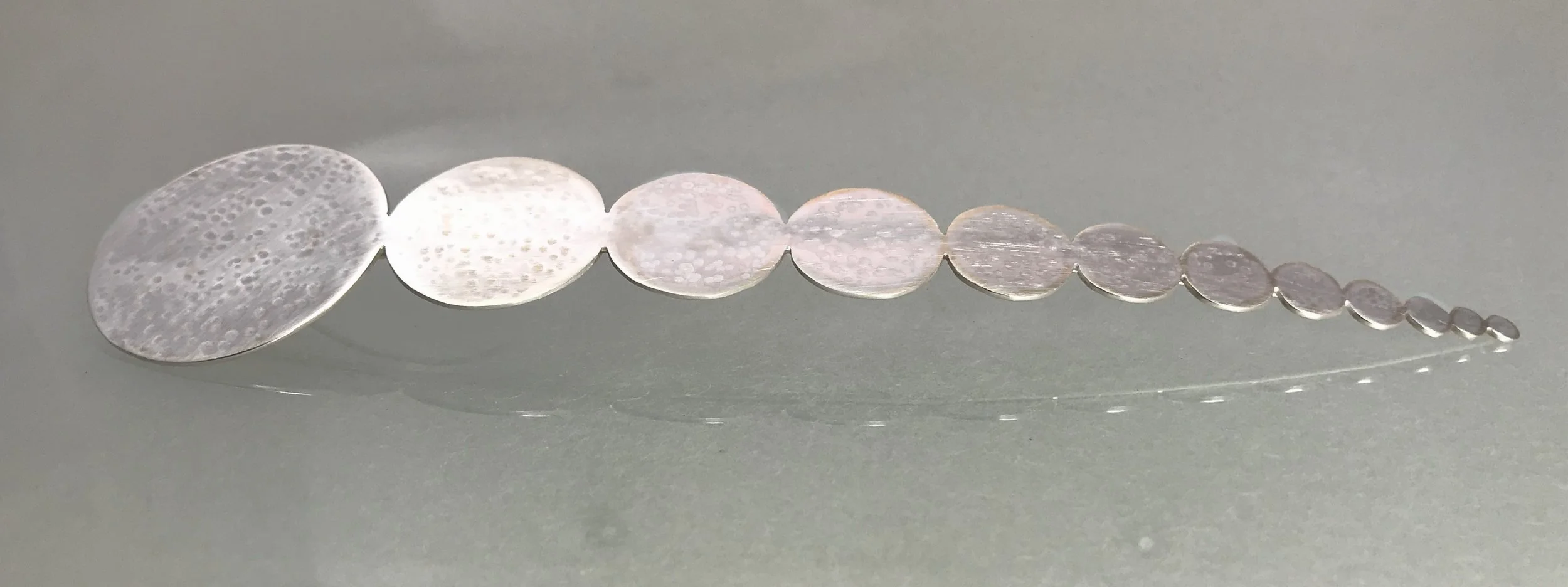 12 Circles in Line Pendant.jpg