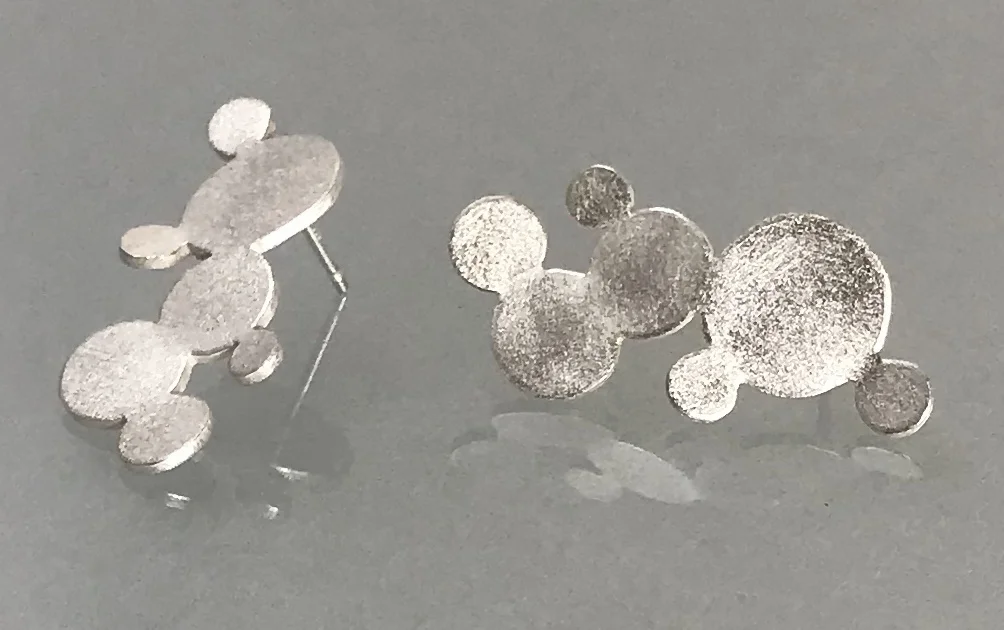 7 Circle Cluster Studs:1.jpg
