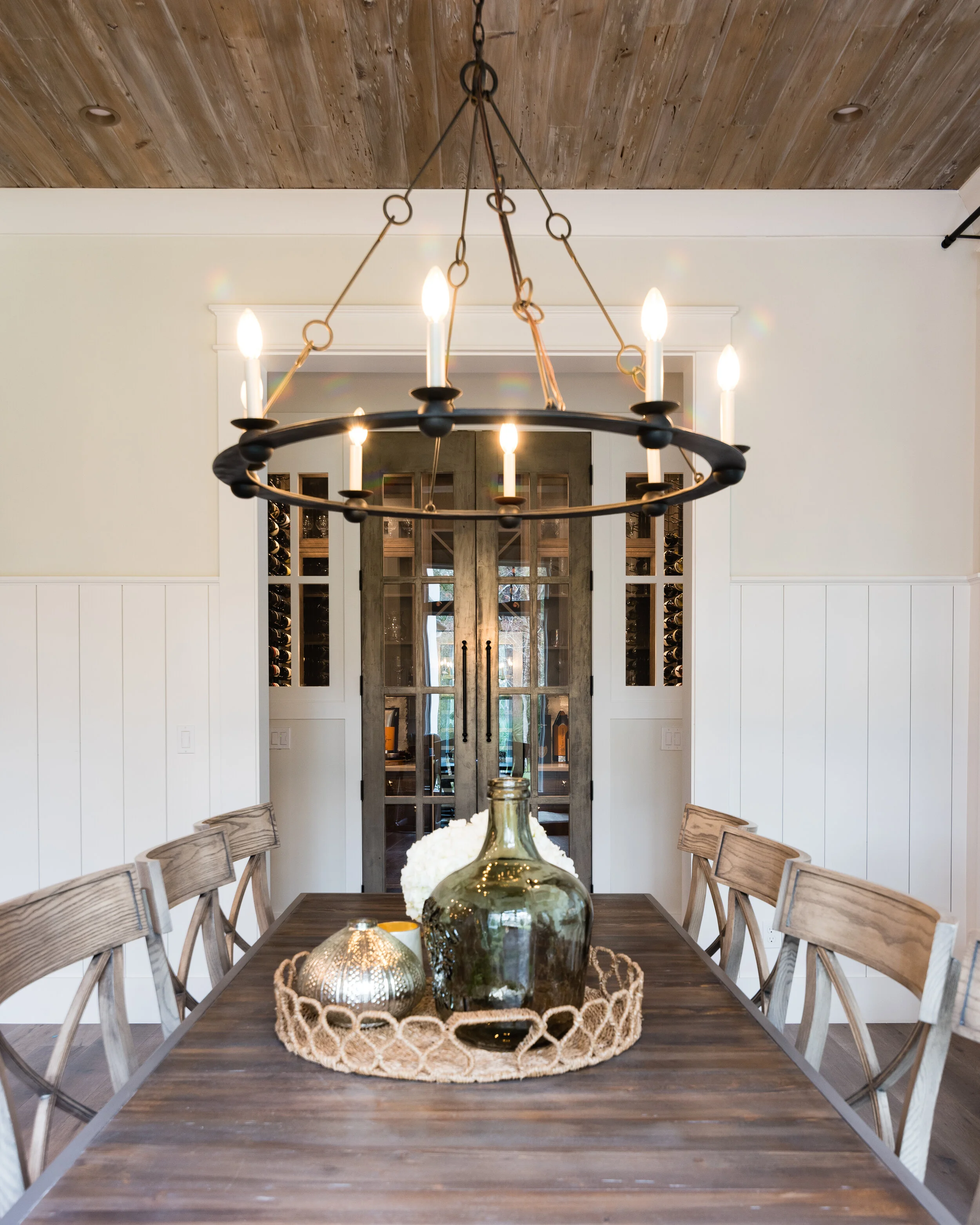 Liquid metal wine cabinet doors and cypress ceiling 