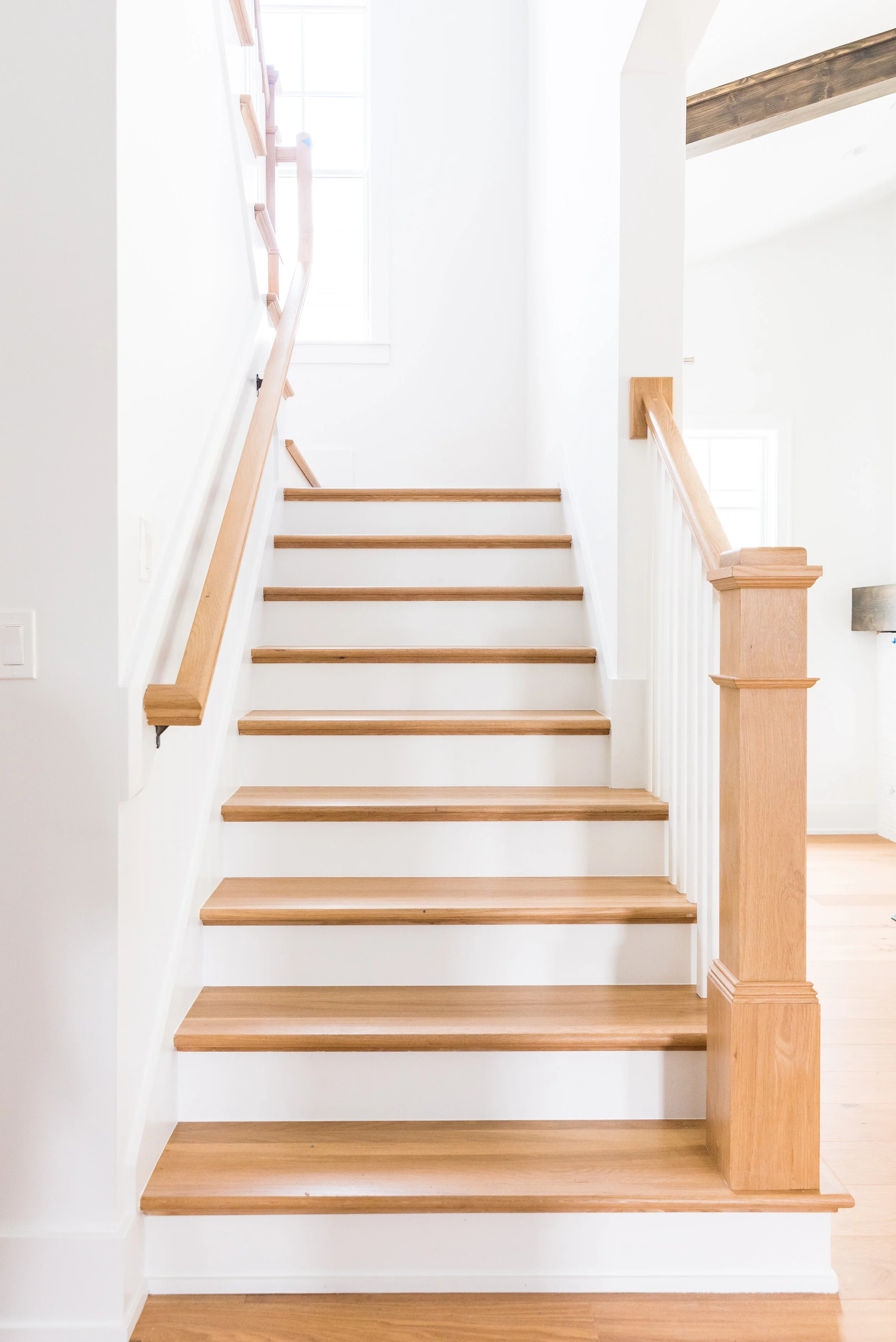 Stained oak staircase in luxury beach house