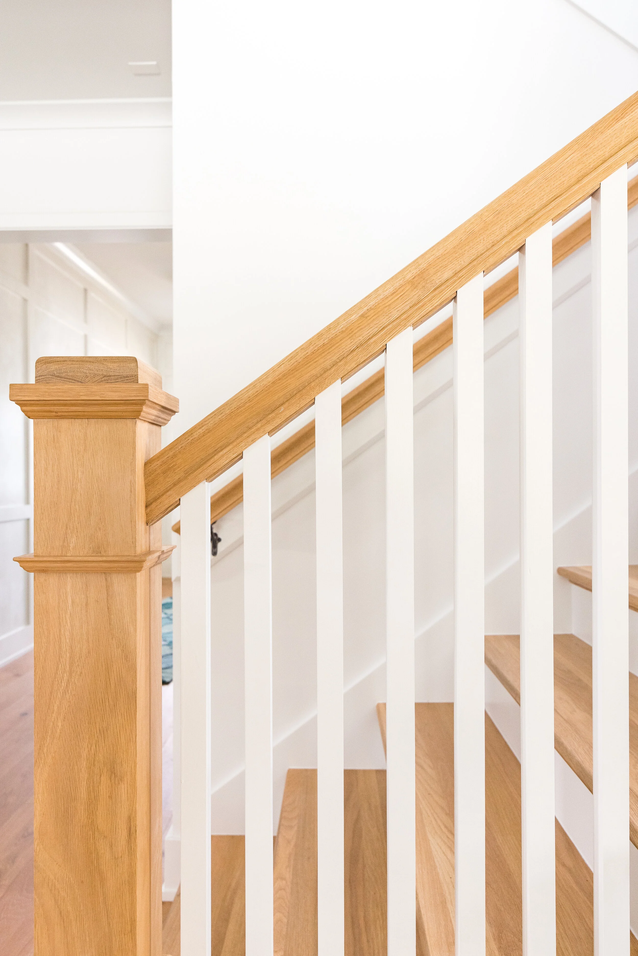 Stained oak staircase luxury beach house 