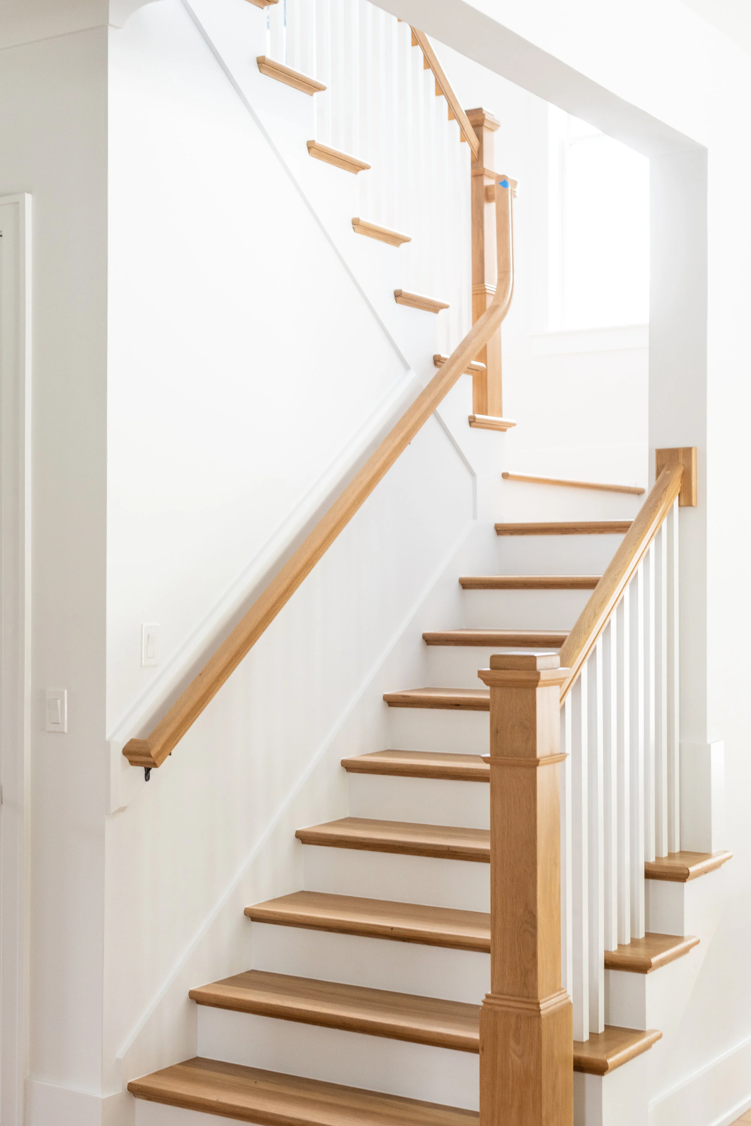 Stained Oak  staircase in luxury beach house 