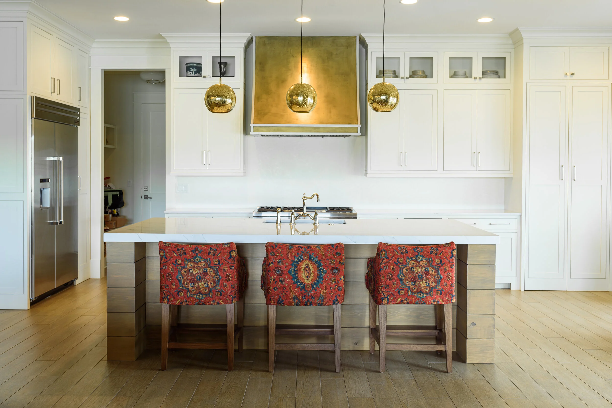 Liquid Metal finished range hood in kitchen