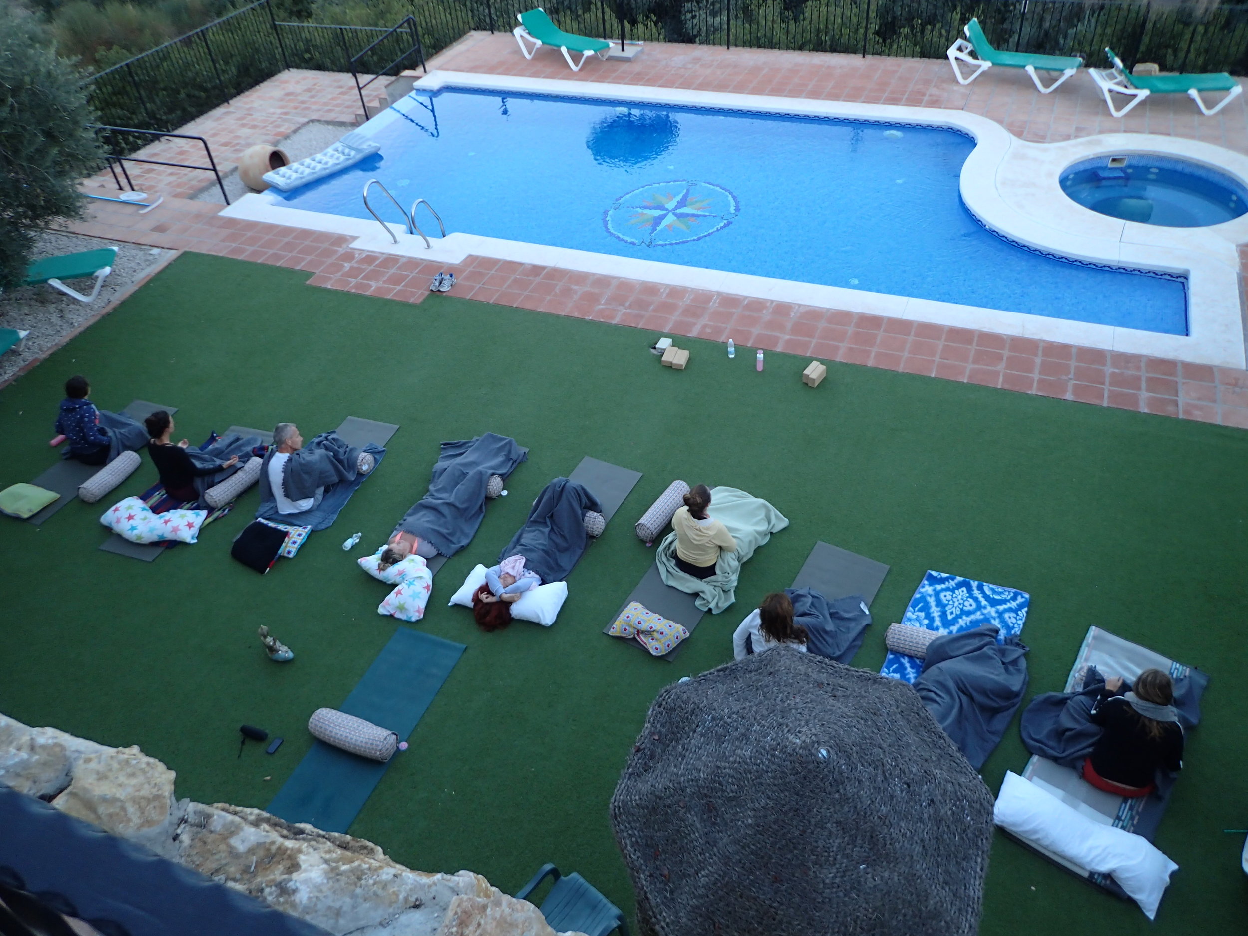 Yoga Nidra at pool at Yin Yang Yoga retreat in the Malaga mountains in Spain with Jane Bakx Yoga