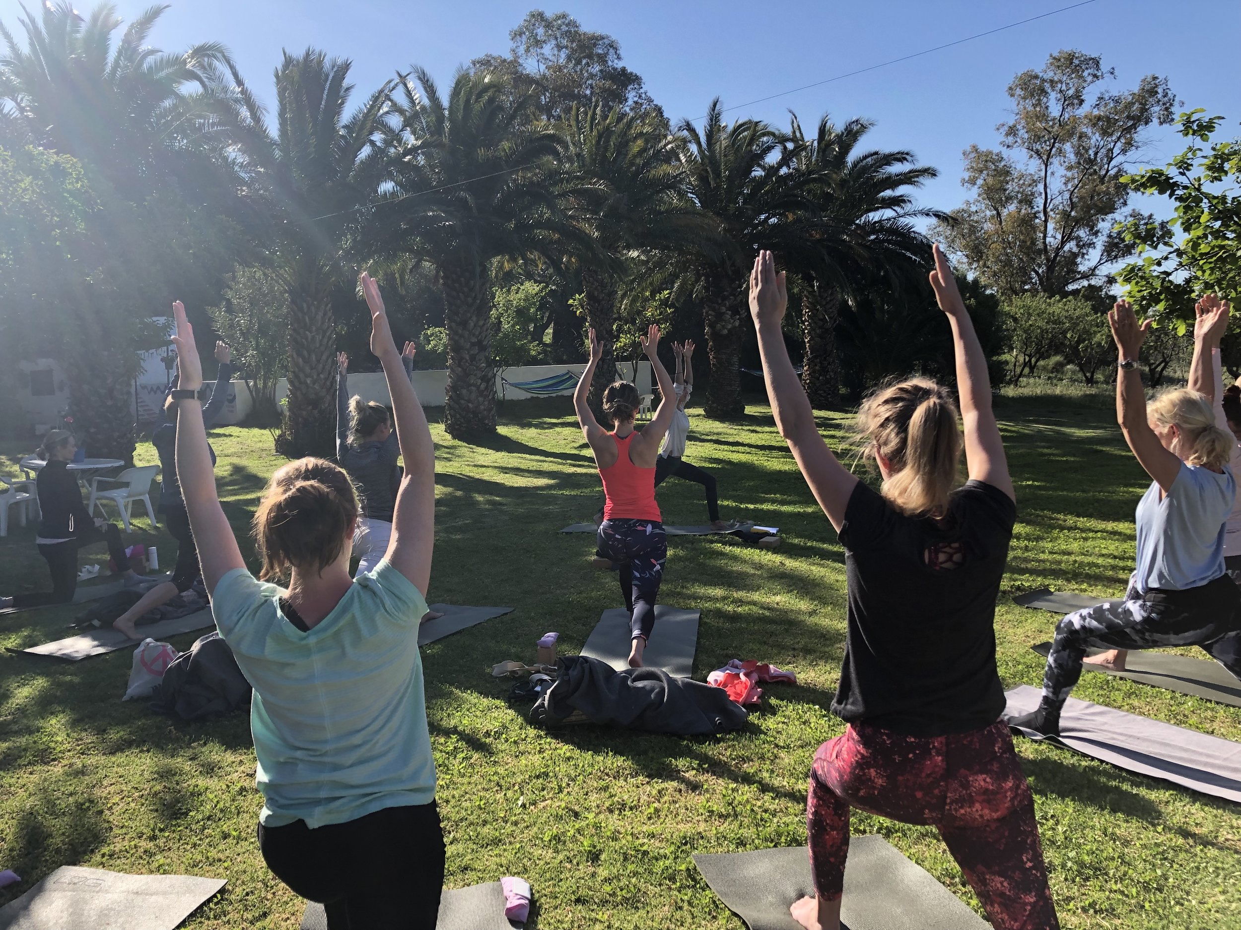 High lunge in the garden at Yin Yang Yoga retreat in the Malaga mountains in Spain with Jane Bakx Yoga 