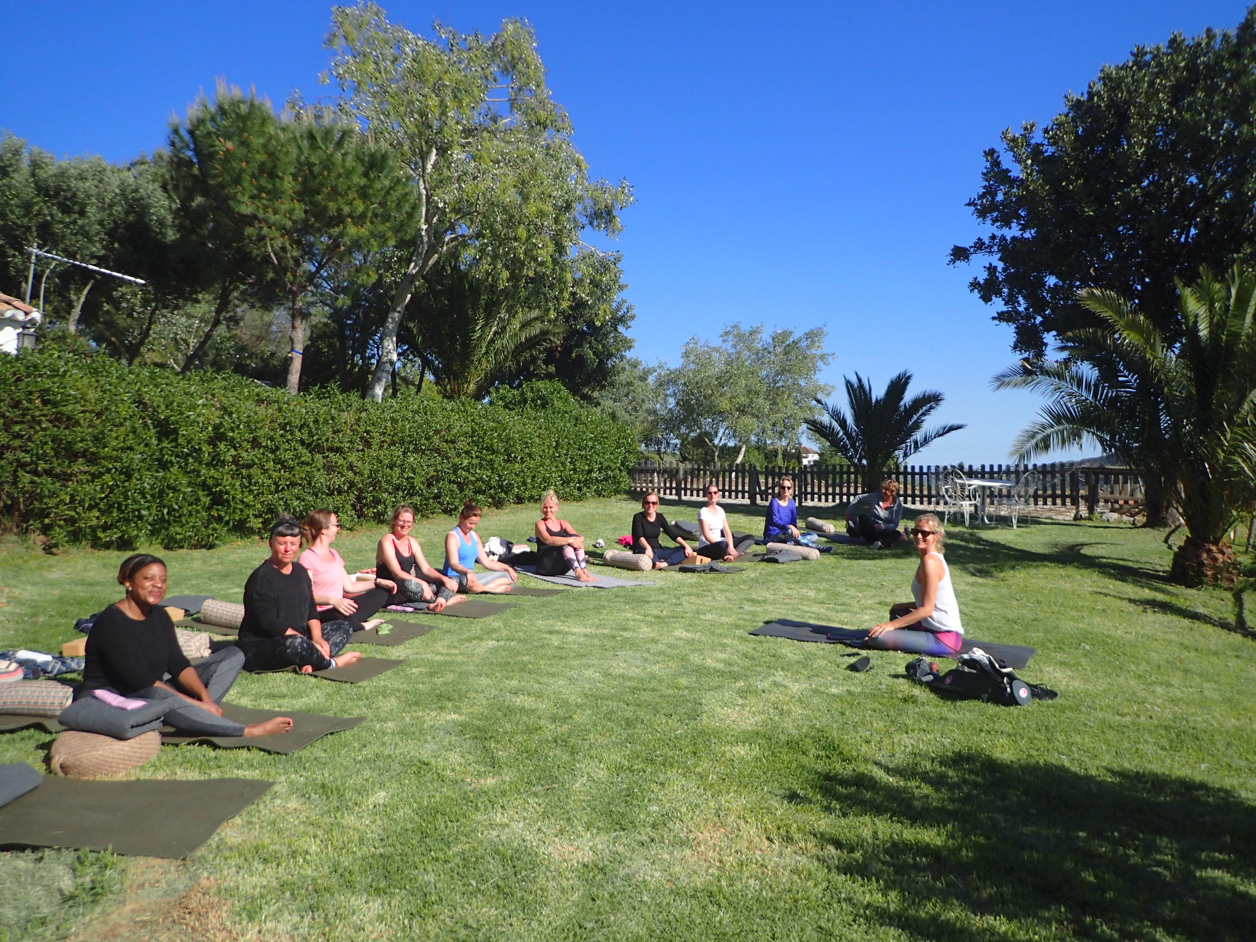 Afternoon yin yoga in the sun at Yoga retreat in the Spanish mountains with Jane Bakx Yoga.
