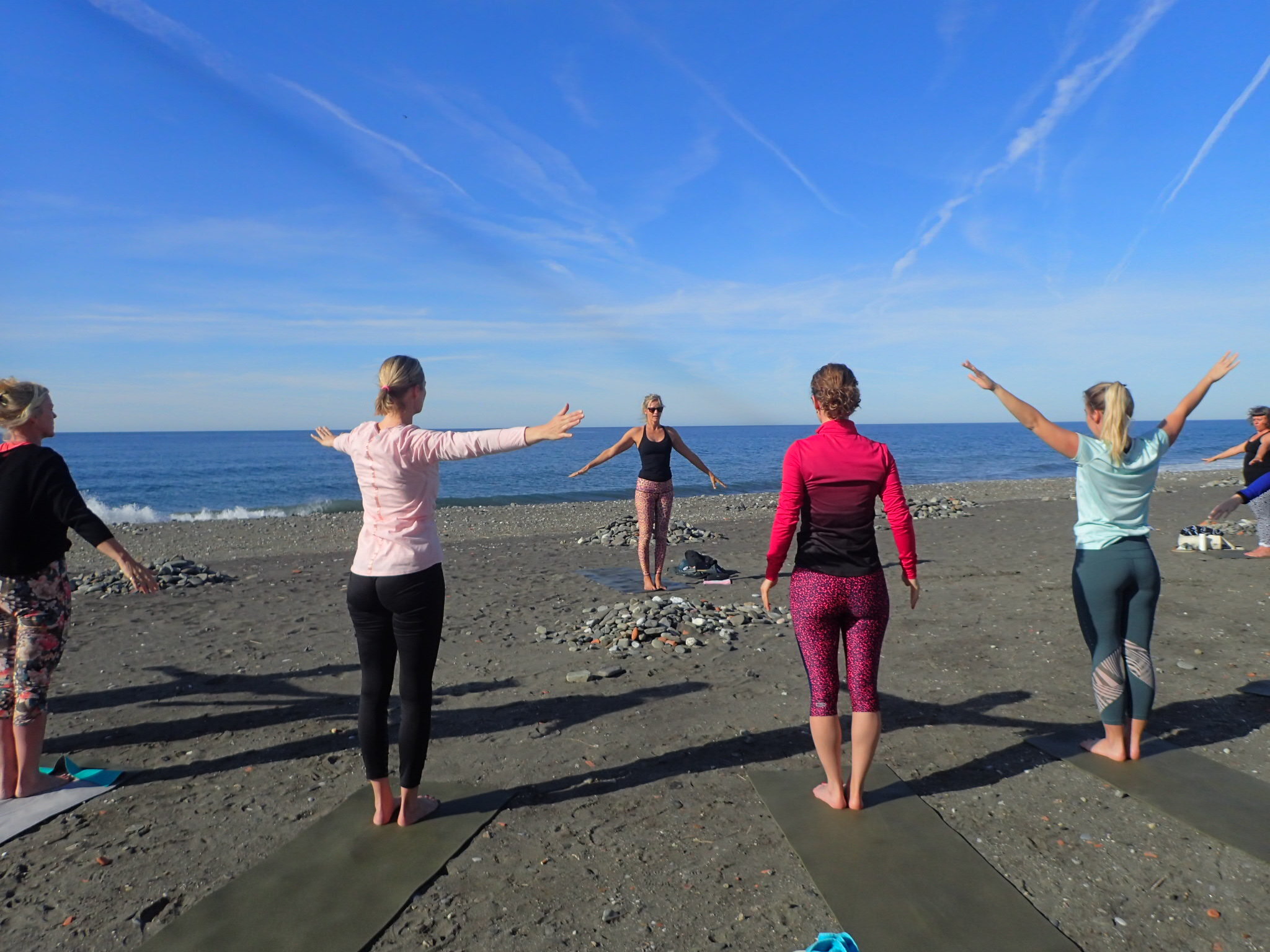 Yoga on the beach at Yin Yang Yoga retreat in the Malaga mountains in Spain with Jane Bakx Yoga 