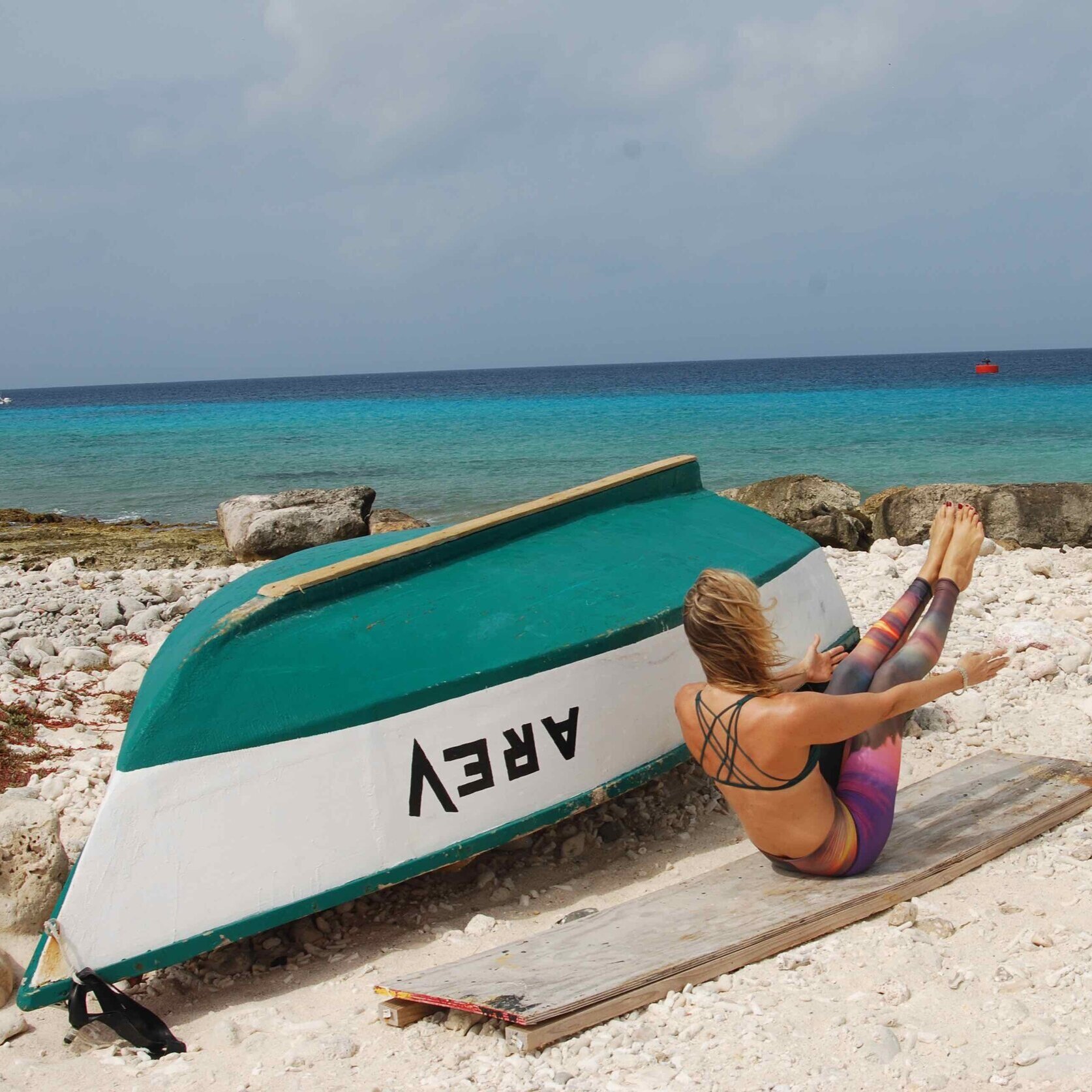 Navasana on beach Jane Bakx Yoga Bonaire (Copy)