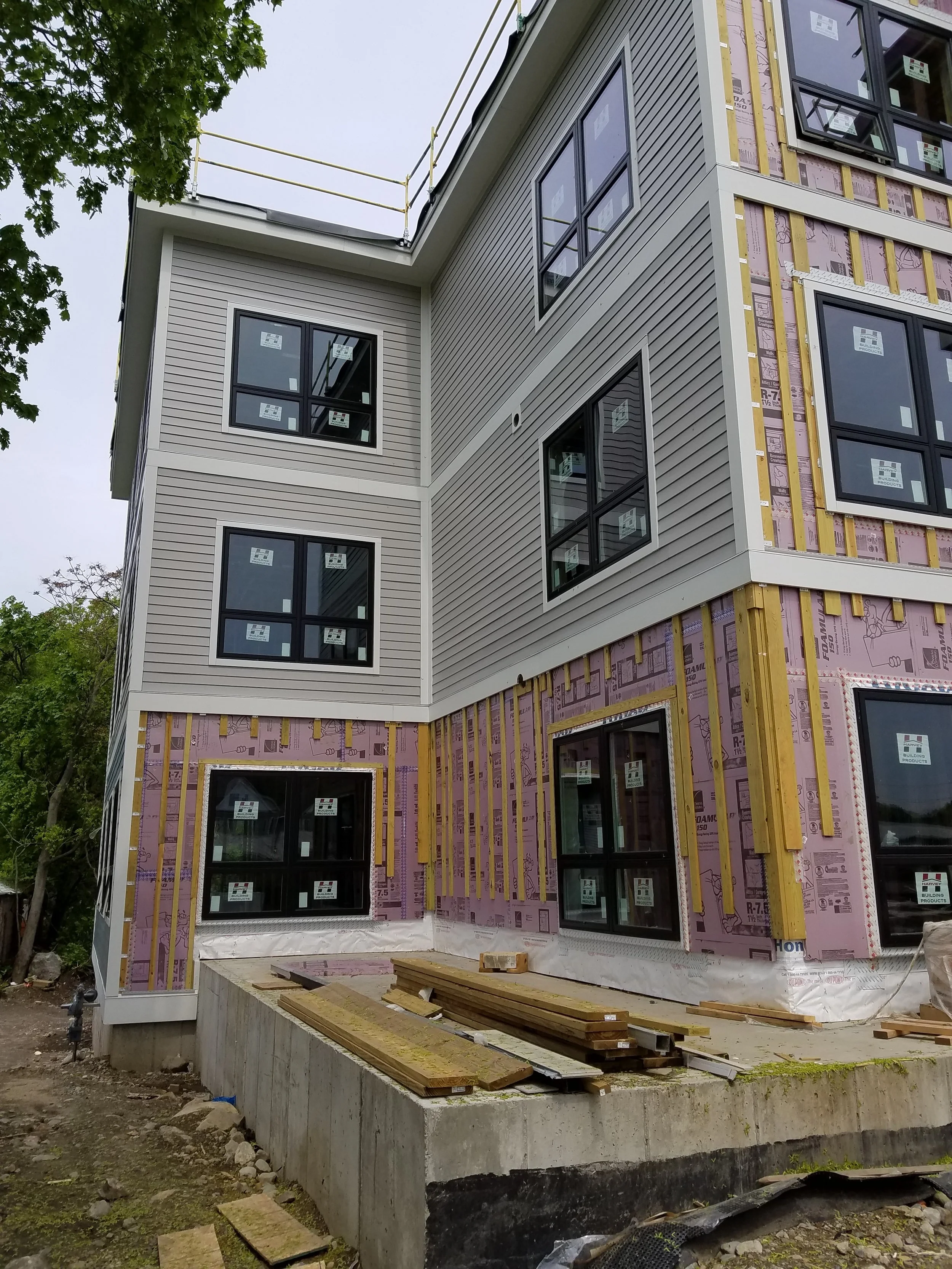 Installation of siding along Nott St.