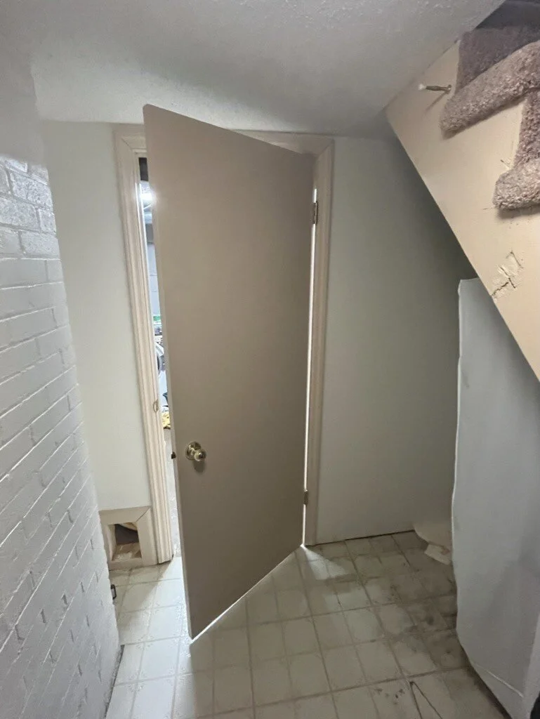 Before: unfinished basement