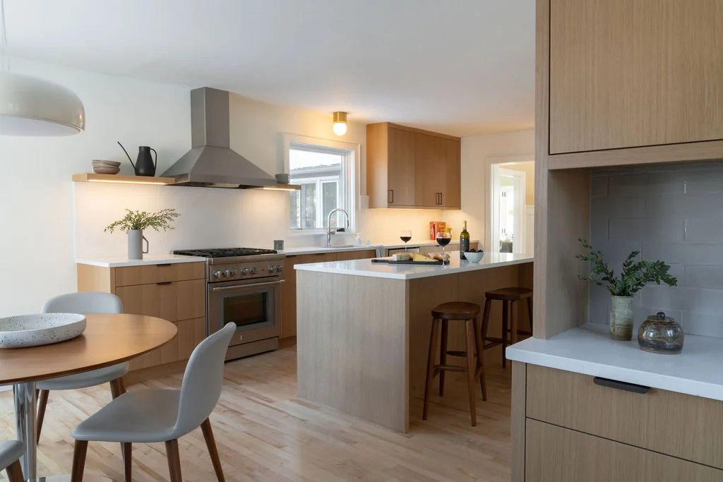 Classic Tudor Built In 1921; Modern European Inspired Kitchen Remodel in St. Paul, MN by Tusk Builders project photo