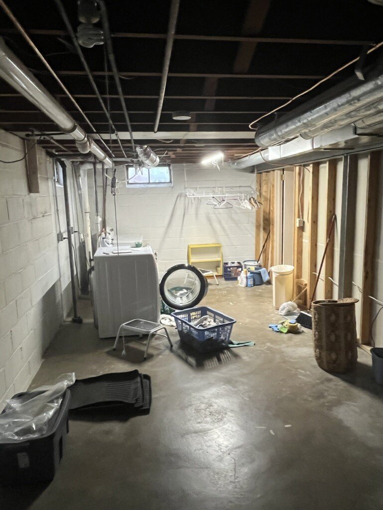 Before: unfinished basement