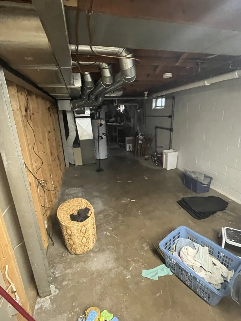 Before: unfinished basement