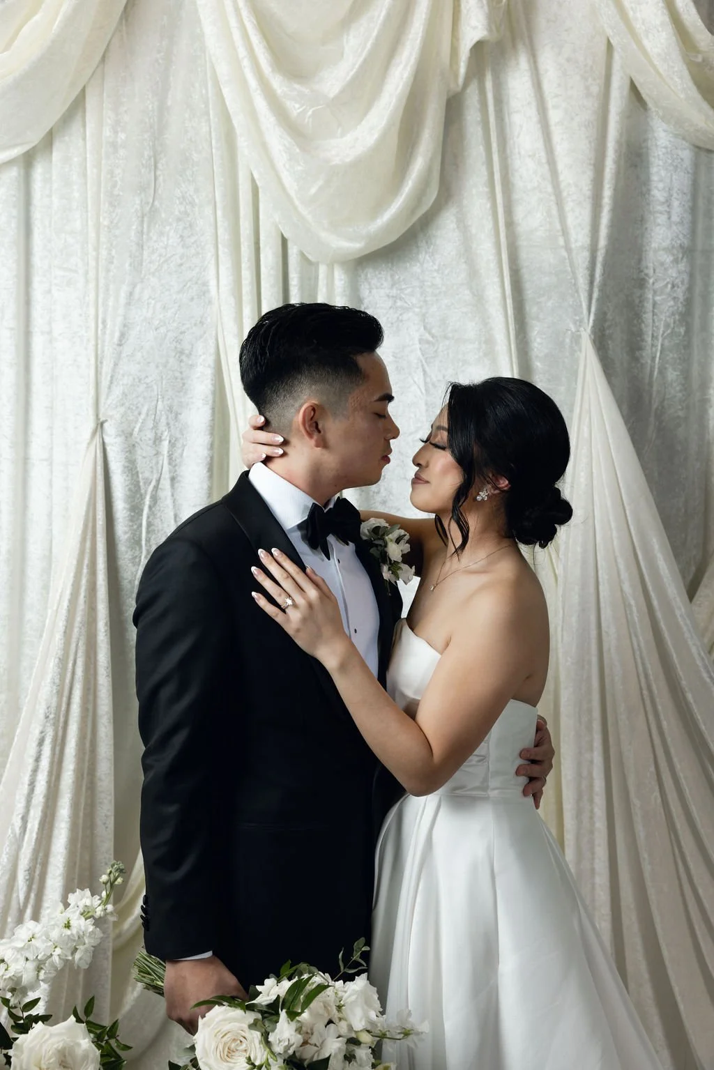 Houston luxury wedding florist designing sophisticated floral arrangements at Luminaire venue with timeless romantic styling.