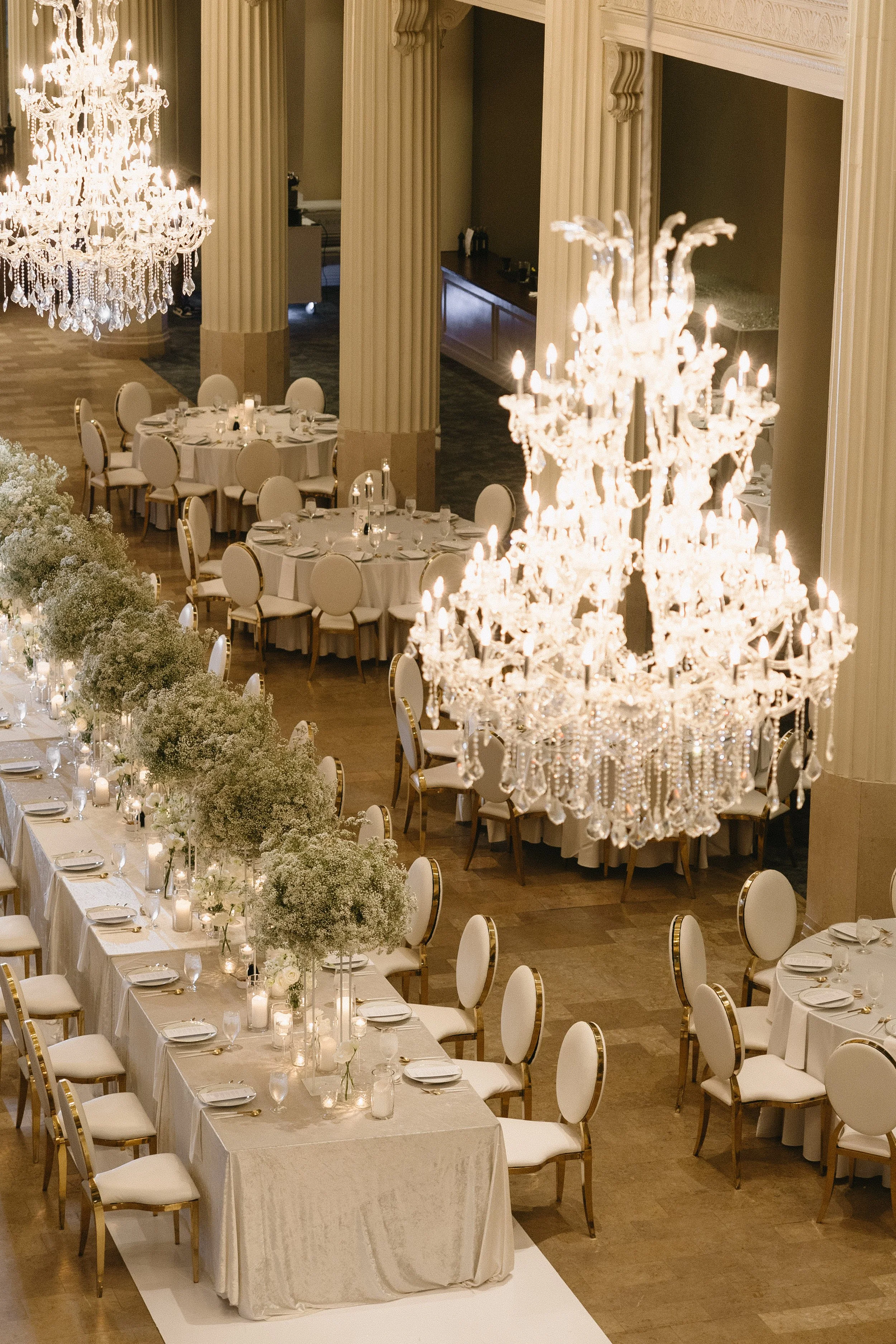 Baby's breath meadow ceremony inspo at The Corinthian Houston. This cloud-like floral installation is the ultimate in soft, romantic luxury wedding design.