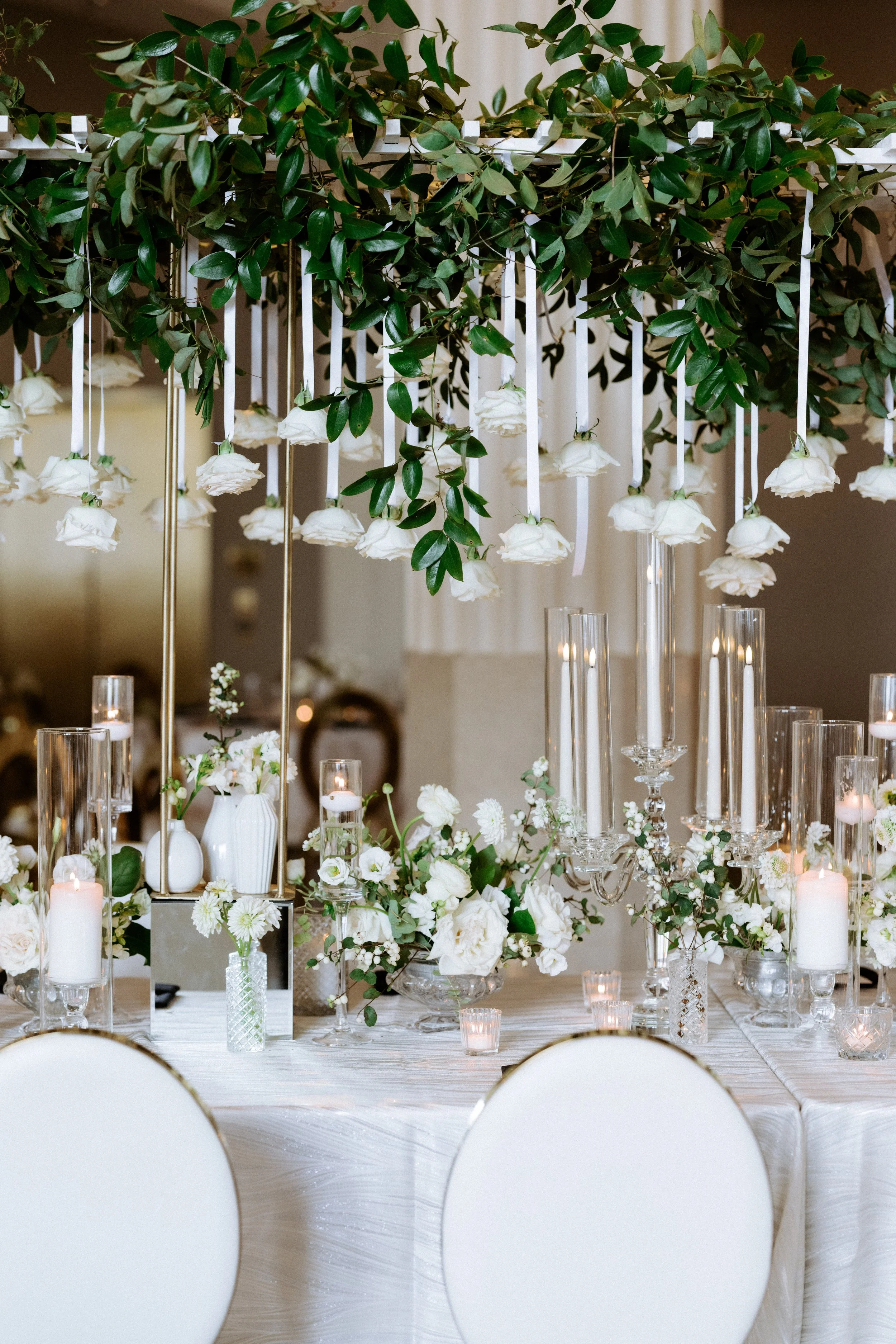 Hanging rose installation head table inspo at The Corinthian Houston.