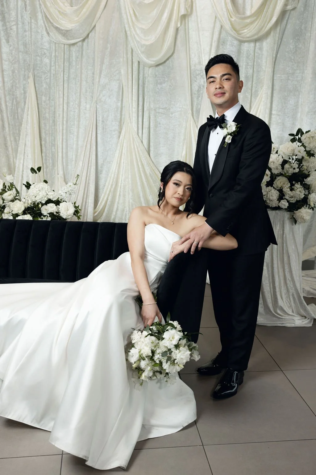 Houston luxury wedding florist designing sophisticated floral arrangements at Luminaire venue with timeless romantic styling.