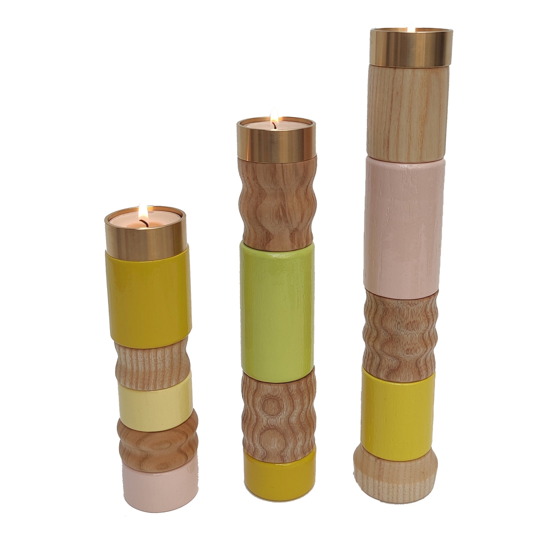 Flotsam and jetsam candlesticks (yellow with candles in a row).jpg