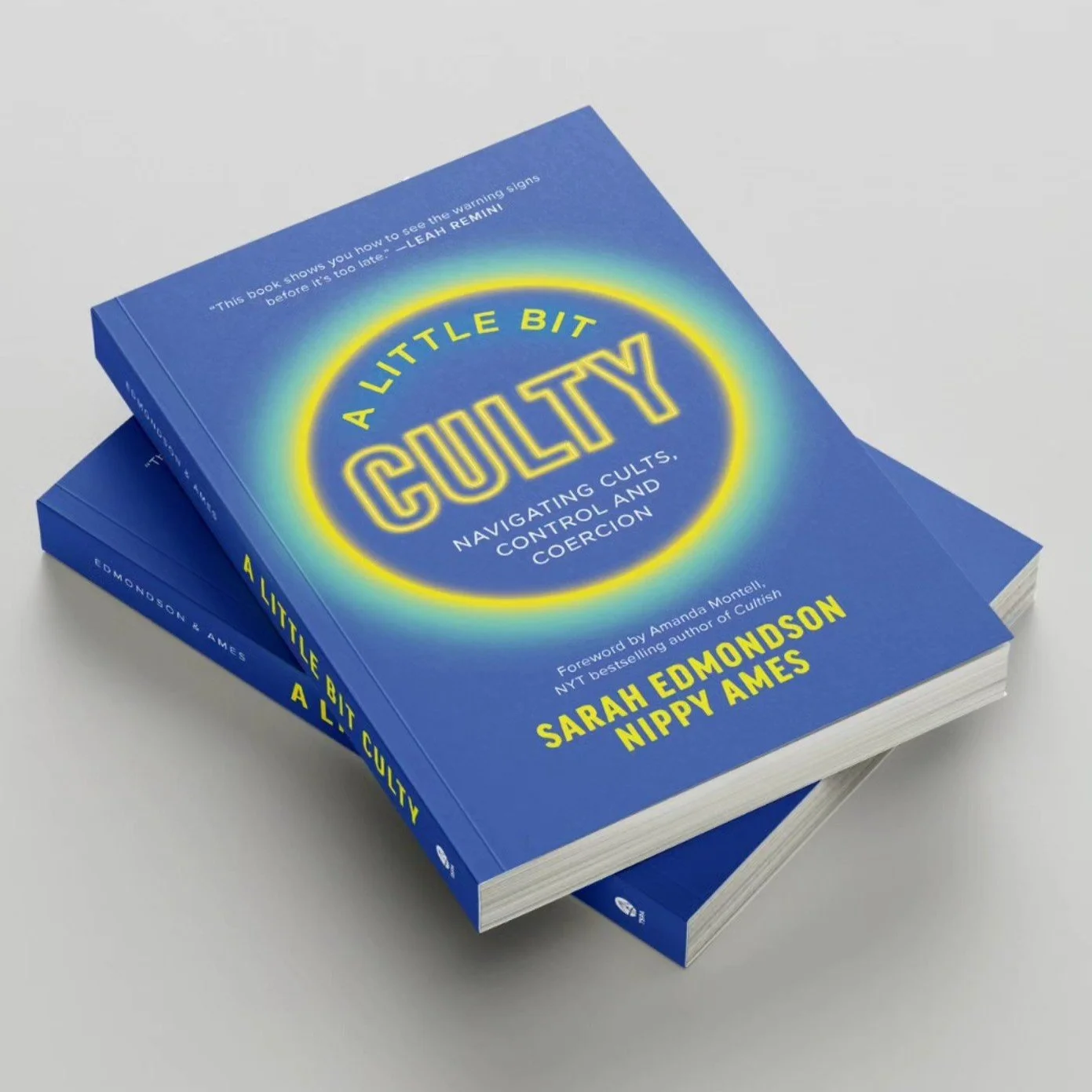 A stack of two A Little Bit Culty books