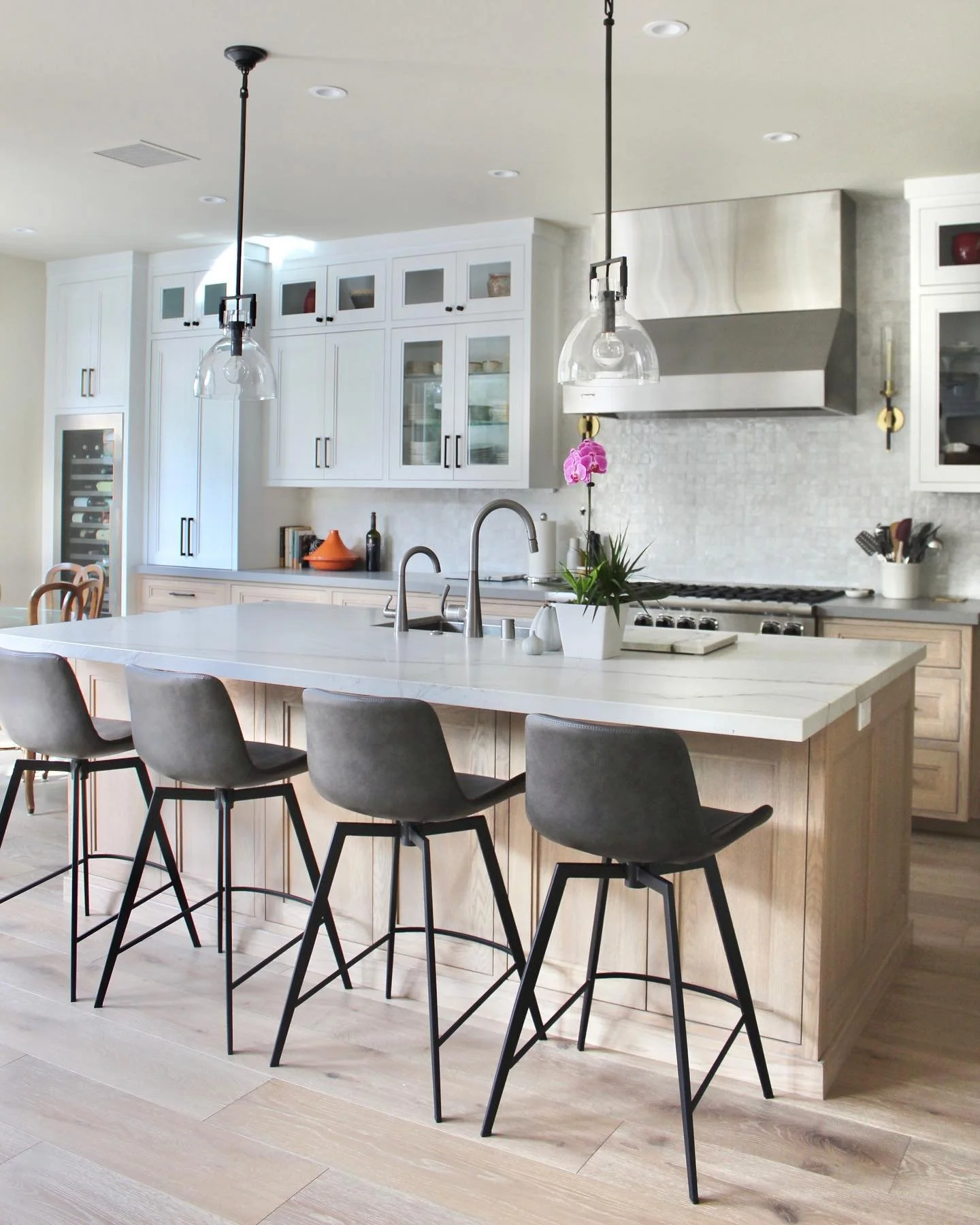 These washed cabinets took a while to make but they turned out beautifully! We stained them first then had a painter come in and touch up each cabinet to make sure it all was the same tone. 😍