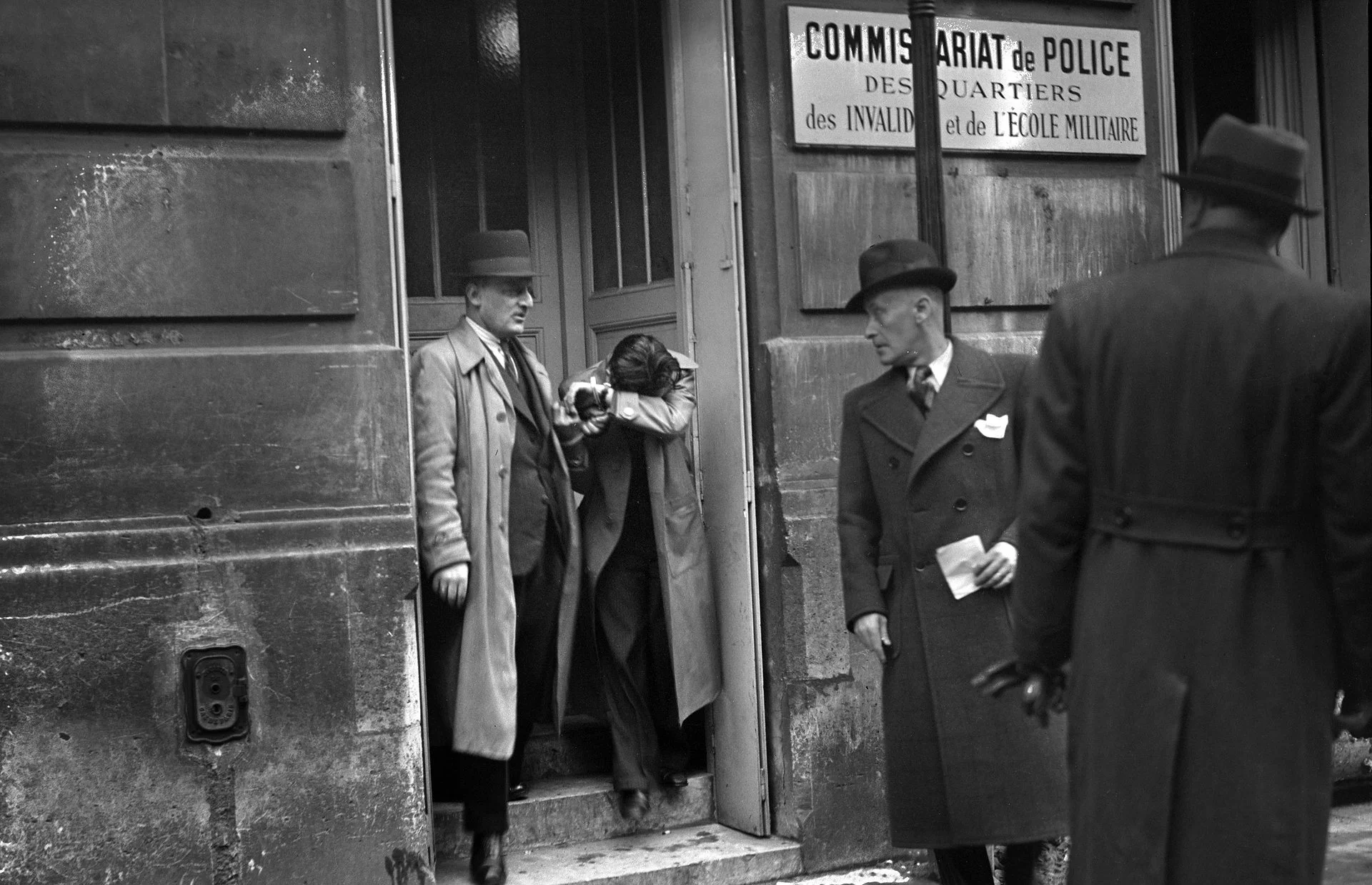 Images of Herschel Gryszpan being taken into police custody after shooting Ernst vom Rath